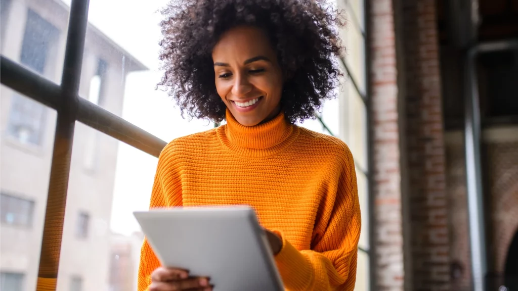 Woman curiously looking at work material